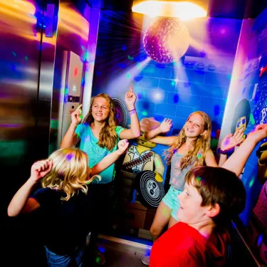 Kids dance along in the Disco Dance Party Elevator