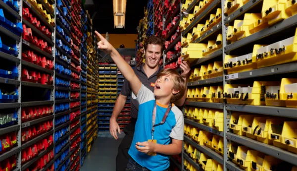 Kid taking a tour of the Model Shop